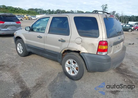 2007 Ford Escape Xlt z USA, uszkodzony, nr VIN 1FMYU93157KB25859